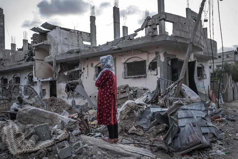 Palestinians inspect the rubble of their destroyed houses after a ceasefire between Israel and Gaza fighters, in Beit Hanun, northern Gaza Strip in Gaza City, Gaza. The ceasefire between Israel and Hamas appeared to be holding, despite fresh clashes at Al-Aqsa Mosque in East Jerusalem. The ceasefire brings to an end eleven days of fighting which killed more than 250 Palestinians, many of them women and children, and 13 Israelis. The conflict began on May 10th after rising tensions in East Jerusalem and clashes at the Al Aqsa Mosque compound. Getty Images