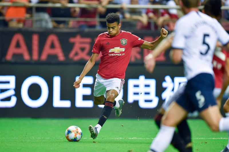 Manchester United's Mason Greenwood kicks the ball during the International Champions Cup football tournament between English Premier League sides Manchester United and Tottenham at Hongkou Football Stadium in Shanghai on July 25, 2019. / AFP / HECTOR RETAMAL
