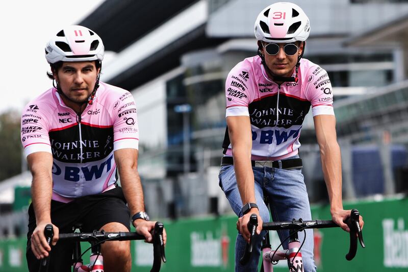 MONZA, ITALY - AUGUST 31: Teammates Sergio Perez of Mexico and Force India and Esteban Ocon of France and Force India cycle the track during previews for the Formula One Grand Prix of Italy at Autodromo di Monza on August 31, 2017 in Monza, Italy.  (Photo by Getty Images/Getty Images)