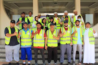 Members of Oman's deaf community during the cleanup in Khaburah. Photo: Azza Al-Mabsali