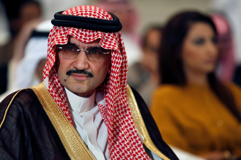 FILE PHOTO - Saudi billionaire Prince AlWaleed bin Talal looks on during a news briefing in Manama, May 8, 2012. REUTERS/Hamad I Mohammed/File Photo