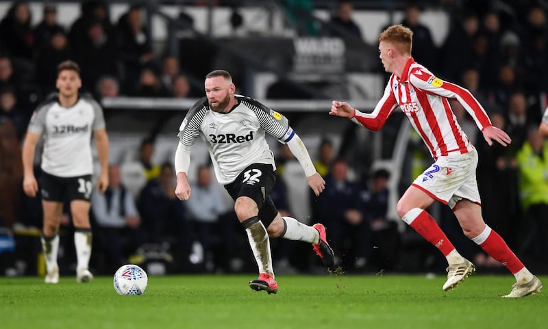 Wayne Rooney runs at ther Stoke defence. Getty