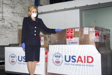 Lana Marks, the US ambassador to South Africa, poses with Covid-19 supplies in May. She took over her diplomatic role in October 2019. AP Photo