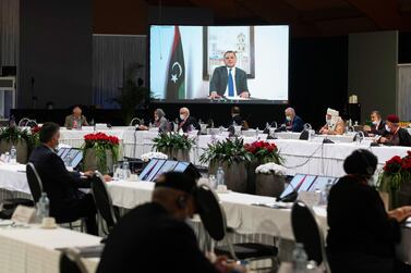 This handout picture taken on February 3, 2021 at an undisclosed location near Geneva and released by the United Nations (UN) shows Abdul Hamid Mohammed Dbeibah delivering a speech via video link during a meeting of the Libyan Political Dialogue Forum (LPDF). Libyan delegates at UN-facilitated talks on February 5, 2021 chose Abdul Hamid Mohammed Dbeibah as the transitional prime minister, along with a three-member presidency council, to govern the war-ravaged North African country until December elections. - RESTRICTED TO EDITORIAL USE - MANDATORY CREDIT "AFP PHOTO/ UNITED NATIONS" - NO MARKETING - NO ADVERTISING CAMPAIGNS - DISTRIBUTED AS A SERVICE TO CLIENTS / AFP / UNITED NATIONS / Handout / RESTRICTED TO EDITORIAL USE - MANDATORY CREDIT "AFP PHOTO/ UNITED NATIONS" - NO MARKETING - NO ADVERTISING CAMPAIGNS - DISTRIBUTED AS A SERVICE TO CLIENTS