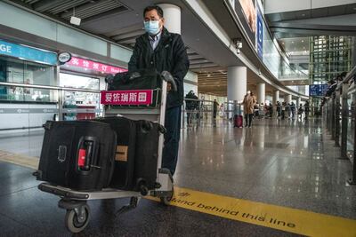 Passengers arriving from overseas, on the first day that quarantine requirements were officially lifted for international arrivals, at Beijing Capital Airport on January 8, 2023. Photo: Bloomberg