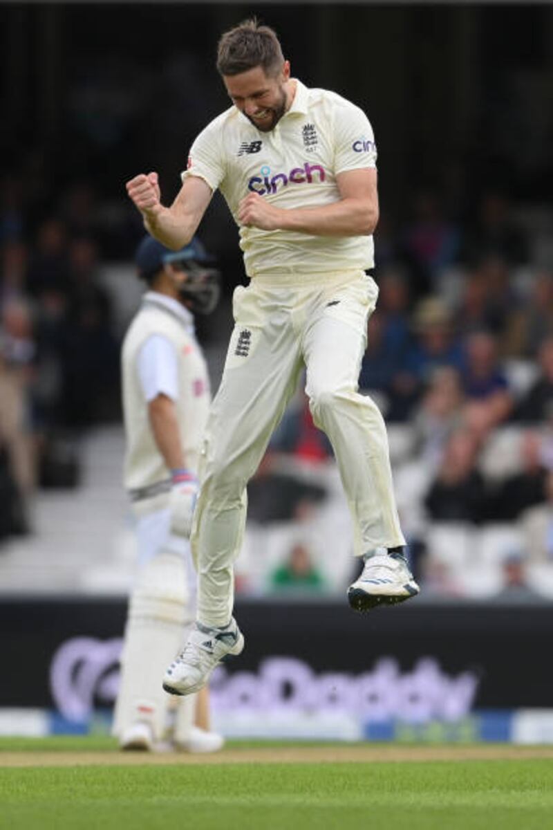 England bowler Chris Woakes celebrates after dismissing Ravindra Jadeja. Getty