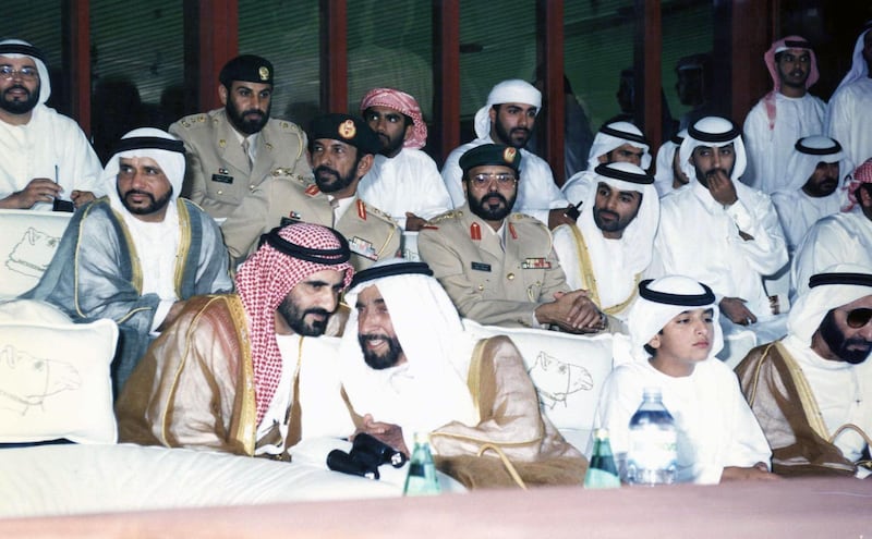 Sheikh Zayed Bin Sultan Al Nahyan and Sheikh Mohammed Bin Rashid Al Maktoum watching the final race of the Annual Camel Festival at Nad Al Sheba, Dubai, 10th April 1996
Source: WAM 
National Archives images supplied by the Ministry of Presidential Affairs to mark the 50th anniverary of Sheikh Zayed Bin Sultan Al Nahyan becaming the Ruler of Abu Dhabi. *** Local Caption ***  87c.jpg