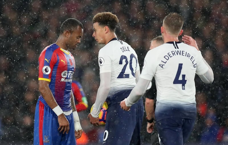 Soccer Football - Premier League - Crystal Palace v Tottenham Hotspur - Selhurst Park, London, Britain - November 10, 2018  Crystal Palace's Jordan Ayew clashes with Tottenham's Dele Alli    Action Images via Reuters/Peter Cziborra  EDITORIAL USE ONLY. No use with unauthorized audio, video, data, fixture lists, club/league logos or "live" services. Online in-match use limited to 75 images, no video emulation. No use in betting, games or single club/league/player publications.  Please contact your account representative for further details.