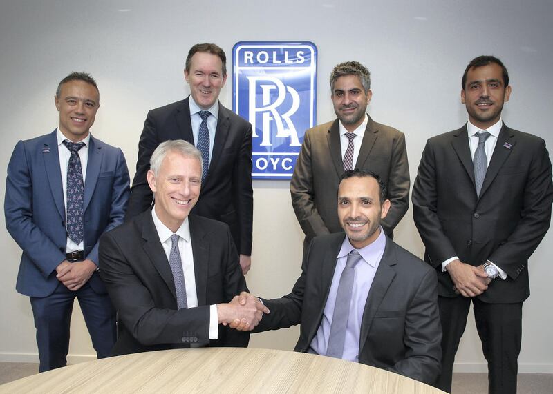 Khaled al Qubaisi, CEO Aerospace, Renewables & ICT at Mubadala and Dominic Horwood, Rolls-Royce, Chief Customer Officer - Civil Aerospace, sign a $6.5bn engine maintenance contract.  