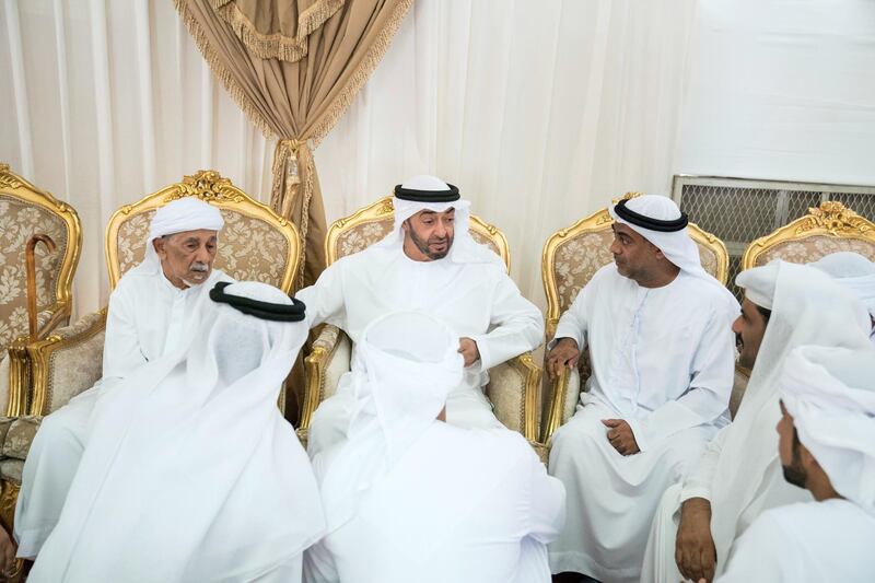 DIBBA, FUJAIRAH, UNITED ARAB EMIRATES - September 16, 2019: HH Sheikh Mohamed bin Zayed Al Nahyan, Crown Prince of Abu Dhabi and Deputy Supreme Commander of the UAE Armed Forces (C), offers condolences to the family of martyr Warrant Officer Ali Abdullah Ahmed Al Dhanhani.

( Hamad Al Kaabi / Ministry of Presidential Affairs )​
---