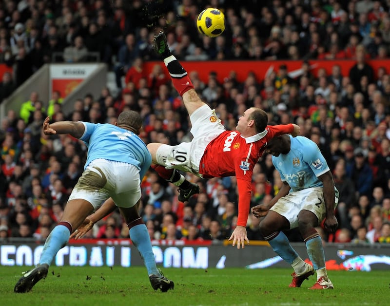 Manchester United striker Wayne Rooney scores his side's second goal during the Premier League match against Manchester City at Old Trafford on February 12, 2011. AFP
