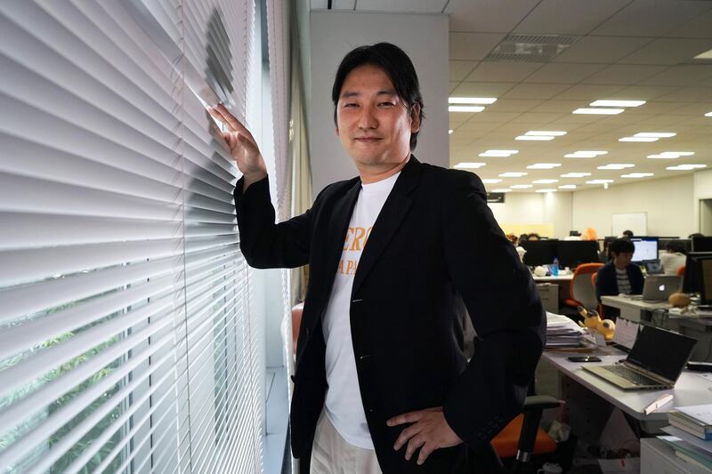 Takahiro Hayashi, co-founder and chief executive officer of Heroz Inc., poses for a photograph in Tokyo, Japan, on Thursday, June 28, 2018. In April, Heroz listed on a startup market on the Tokyo Stock Exchange. The shares opened 11 times higher than the IPO price, the best ever start of trading by a Japanese listed company. Photographer: Kentaro Takahashi/Bloomberg