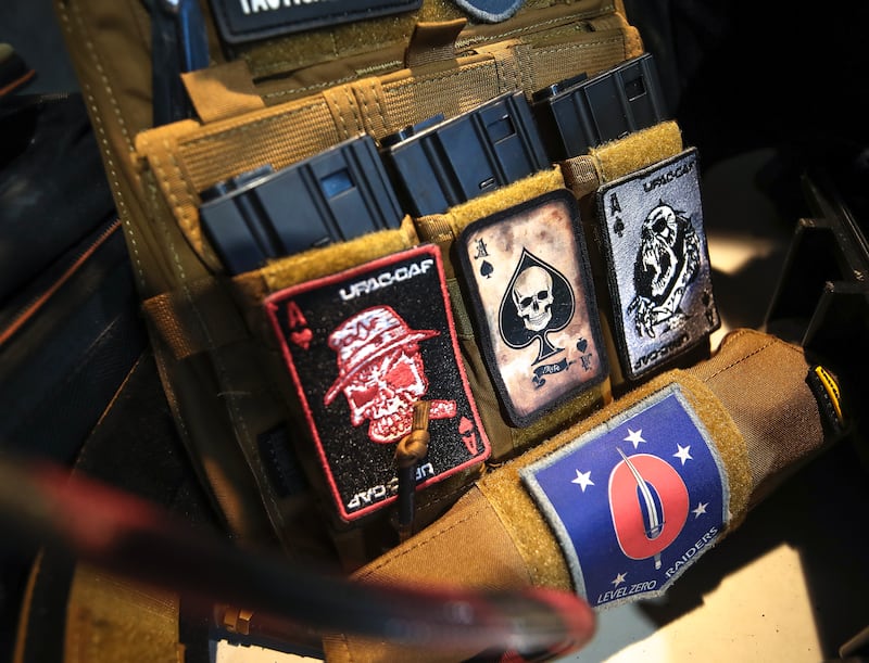 Many players wear a tactical vest with magazine holders and their favourite patch for show