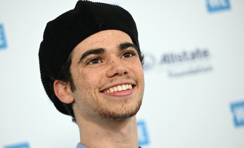 Actor Cameron Boyce arrives for WE Day California at the Forum in Inglewood, California on April 25, 2019. - WE Day is the world’s largest youth empowerment event combining the energy of a live concert with the inspiration of extraordinary stories of leadership and change. WE Day California will bring together world-renowned speakers and award-winning performers to celebrate the tens of thousands of young people from across California who have made a difference in their community. (Photo by Robyn BECK / AFP)