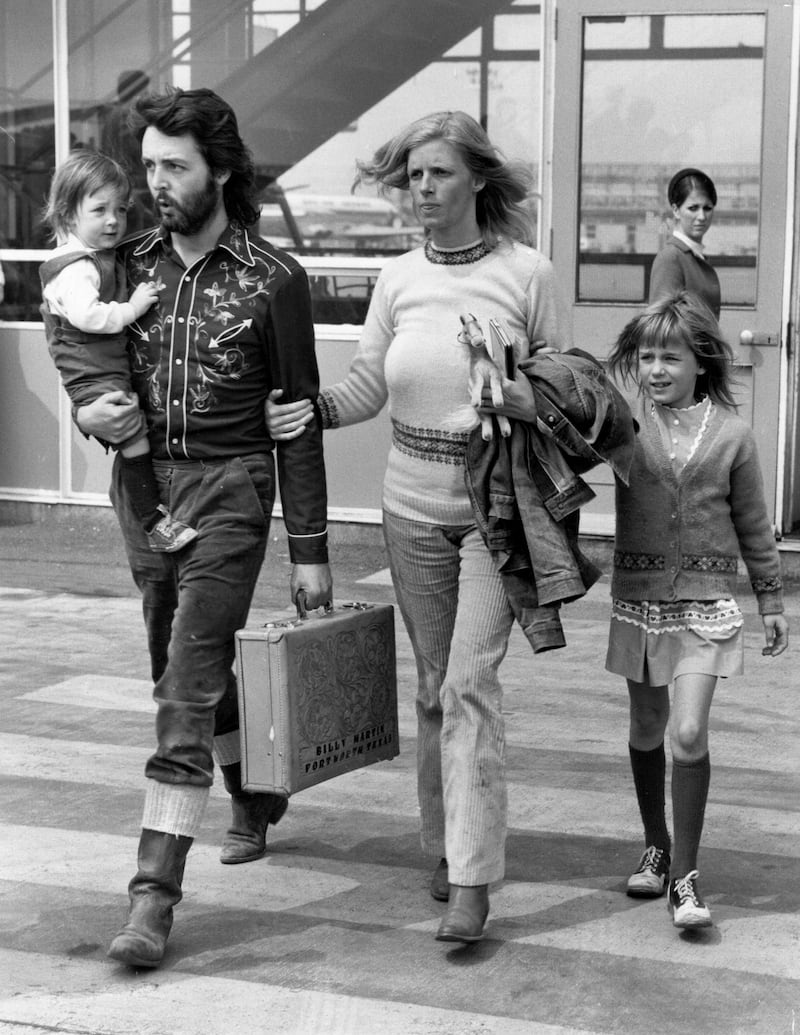 Paul McCartney with his wife Linda and their two children, Mary and Heather, at Gatwick Airport in 1971