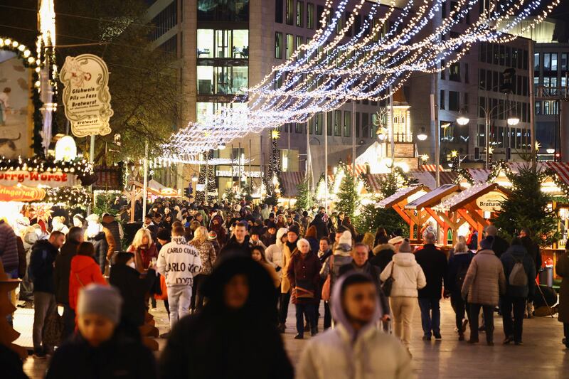 People visit the Breitscheid Square market in Berlin. Reuters