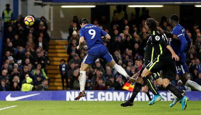 Soccer Football - Premier League - Chelsea vs Brighton & Hove Albion - Stamford Bridge, London, Britain - December 26, 2017   Chelsea’s Alvaro Morata scores their first goal         Action Images via Reuters/John Sibley    EDITORIAL USE ONLY. No use with unauthorized audio, video, data, fixture lists, club/league logos or "live" services. Online in-match use limited to 75 images, no video emulation. No use in betting, games or single club/league/player publications.  Please contact your account representative for further details.