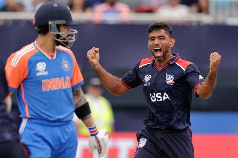 USA bowler Saurabh Nethralvakar celebrates after claiming the wicket of India's Virat Kohli for a golden duck. AP
