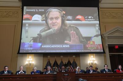 The January 6 committee airs a clip of Steve Bannon's podcast during a public hearing. EPA