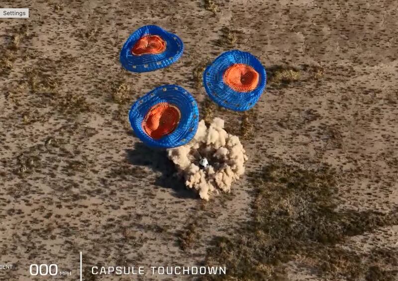 The crew capsule touches down in a Texas desert, near the launch site.