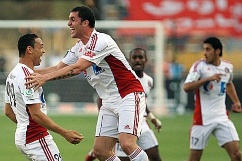 Al Jazira's Ricardo Oliveira, left, and Bare were in attacking mood yesterday.