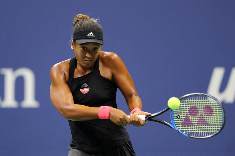 NEW YORK, NY - SEPTEMBER 08: Naomi Osaka of Japan returns the ball during her Women's Singles finals match against Serena Williams of the United States on Day Thirteen of the 2018 US Open at the USTA Billie Jean King National Tennis Center on September 8, 2018 in the Flushing neighborhood of the Queens borough of New York City.   Elsa/Getty Images/AFP (Photo by ELSA / GETTY IMAGES NORTH AMERICA / AFP)