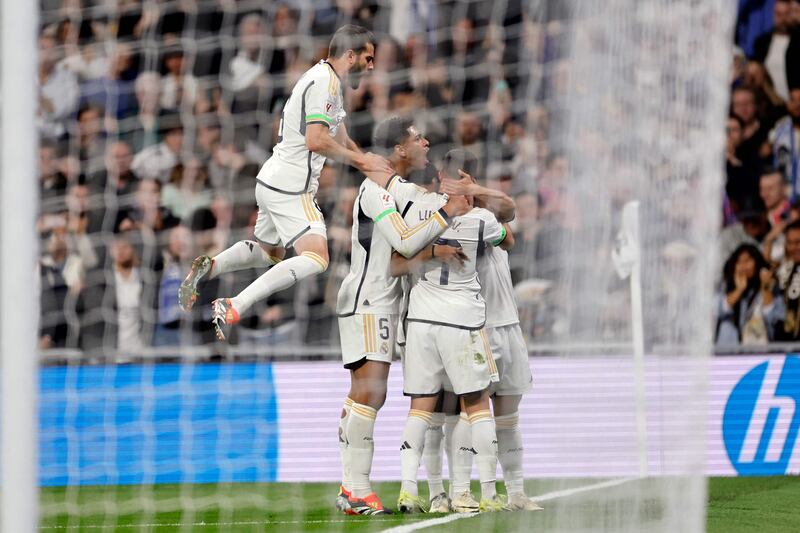 Real Madrid's players celebrate Brahim Diaz's opening goal. AFP
