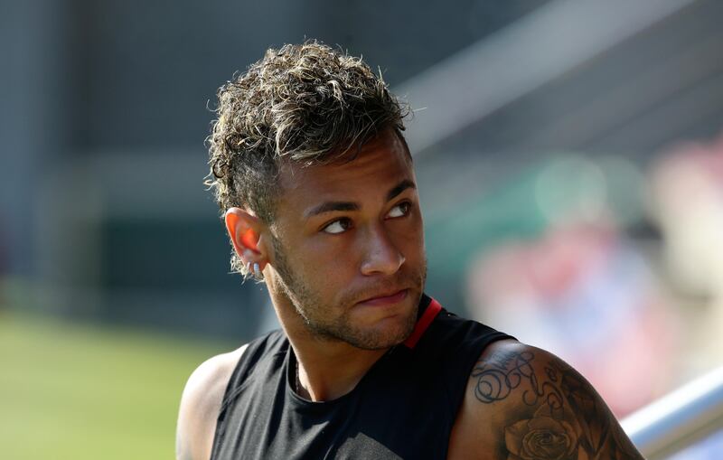 FC Barcelona's Neymar attends a training session at the Sports Center FC Barcelona Joan Gamper in Sant Joan Despi, Spain, Monday, July 17, 2017. (AP Photo/Manu Fernandez)