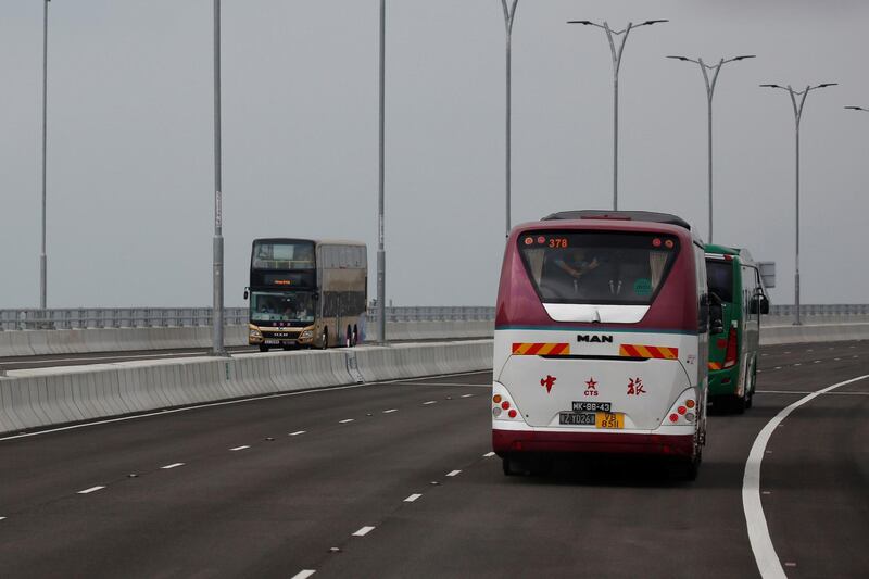 Buses drive on the Hong Kong-Zhuhai-Macau Bridge.Reuters