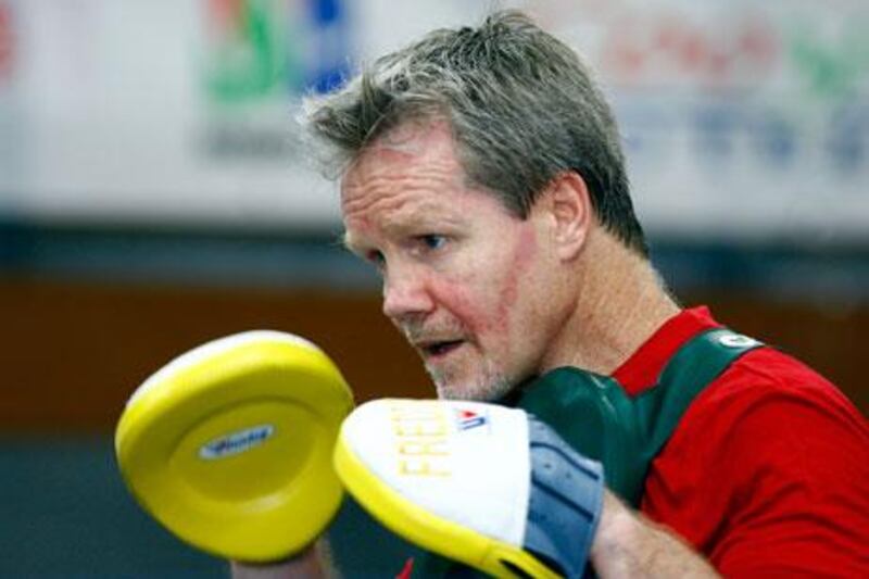 Boxing trainer Freddie Roach working with Manny Pacquiao during fight camp in the Philippines