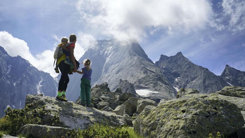 **Sent under embargo, no use before 14.00pm BST August 3 2020**
Leo Houlding with his children on their three day trip to climb Piz Badile. See SWNS story SWPLclimb; A toddler and his seven-year-old sister have smashed records to become the youngest mountain climbers to scale a massive 10,000ft peak and were given a reward - of Haribo. Freya Houlding, seven, and three-year-old Jackson were literally following in their professional climber father's footsteps as he led them up Piz Badile on the border of Switzerland and Italy. Dad Leo Houlding, 40, spends his working life climbing some of the most dangerous and most remote mountains on earth, and his wife, 41-year-old Jessica, a GP, is an avid climber too. And now Freya has become the youngest person to climb the mountain unaided, and Jackson the youngest person to get to the top - 153 years to the day since the peak was first climbed. Jackon says he enjoyed his climb - and the sweets he got as a well done.