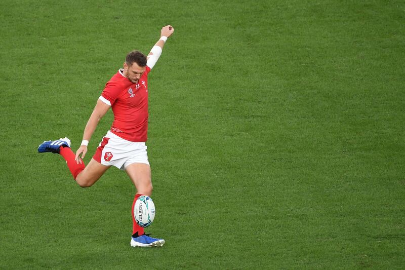Wales' fly-half Dan Biggar kicks for goal. AFP