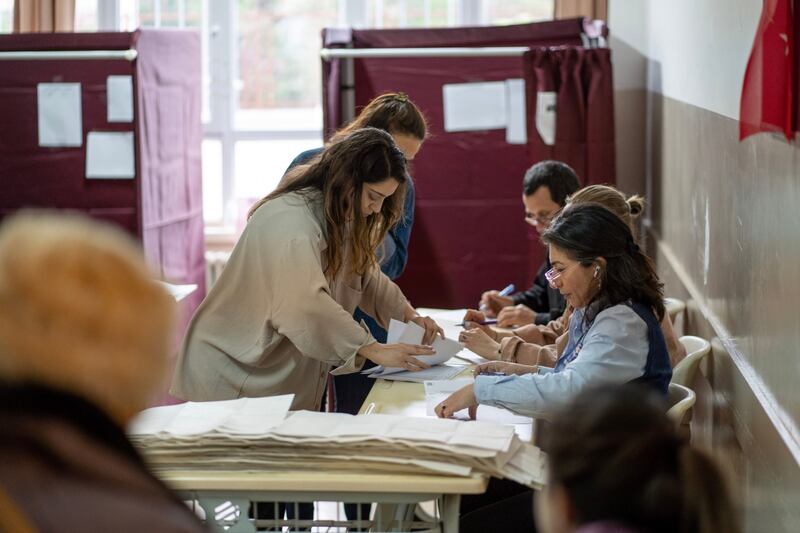 Officials count ballots at a polling station during presidential and parliamentary elections in the Kadikoy district of Istanbul. Bloomberg