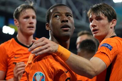 Soccer Football - Euro 2020 - Group C - Netherlands v Ukraine - Johan Cruyff Arena, Amsterdam, Netherlands - June 13, 2021 Netherlands' Georginio Wijnaldum celebrates scoring their first goal with teammates Pool via REUTERS/Peter Dejong     TPX IMAGES OF THE DAY