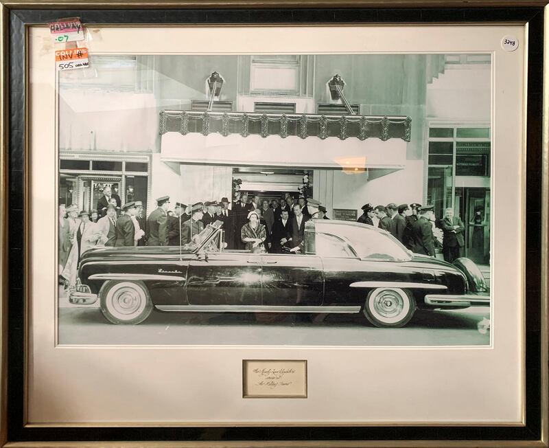 A black and white print of Queen Elizabeth II's visit to Waldorf Astoria New York is for sale.