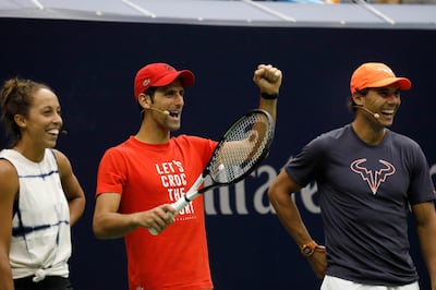 epa06972648 (L-R) Tennis players, Madison Keys, Novak Djokovic and Rafael Nadal participate at the '2018 Arthur Ashe Kids Day' at the 2018 US Open Tennis Championships at the USTA National Tennis Center in Flushing Meadows, New York, USA, 25 August 2018.  EPA/PETER FOLEY