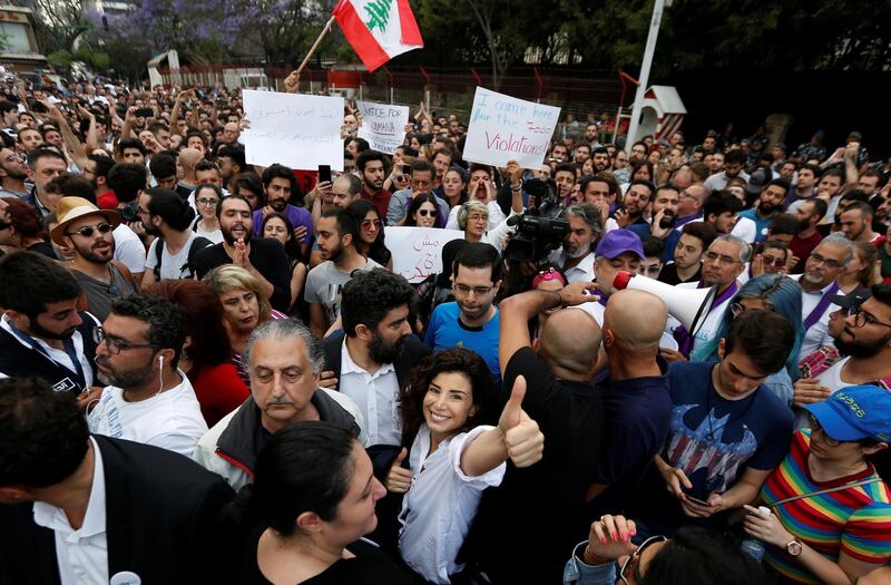 Independent parliamentary candidate Joumana Haddad gestures during a protest in Beirut. Jamal Saidi / Reuters