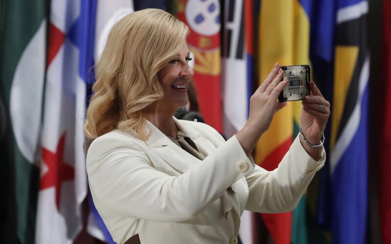 Croatian President Kolinda Grabar-Kitarovic takes a selfie at the delegate luncheon on the sidelines of the General Debate of the General Assembly of the United Nations at United Nations Headquarters.  EPA