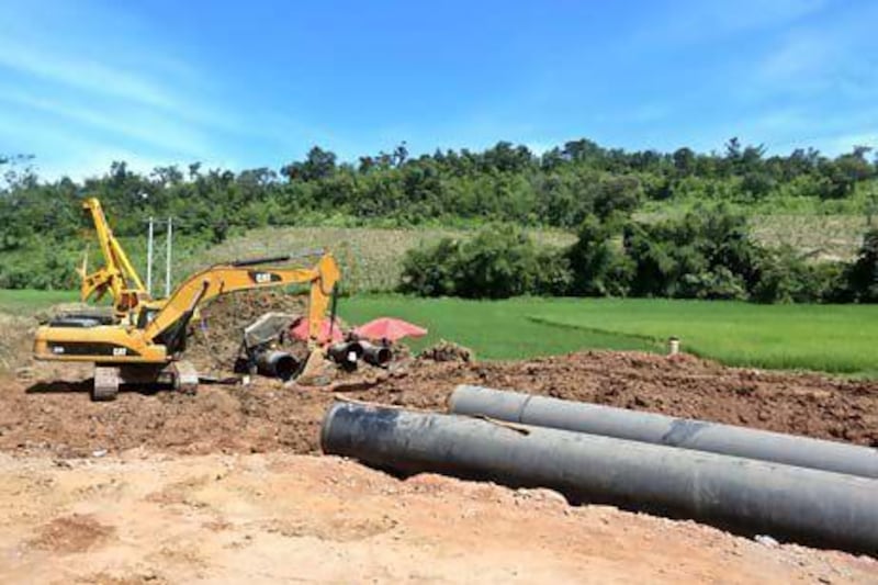 Bulldozers and excavators on the Myanmar-China pipeline project near the northern Shan state in Myanmar. Nyein Chan Naing / EPA