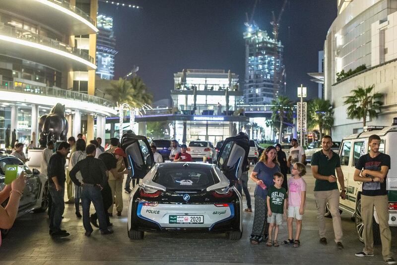 Dubai Police hit the streets in their fleet of luxury cars to showcase the high-end vehicles and interact with residents and tourists prepared for Eid Al Fitr.