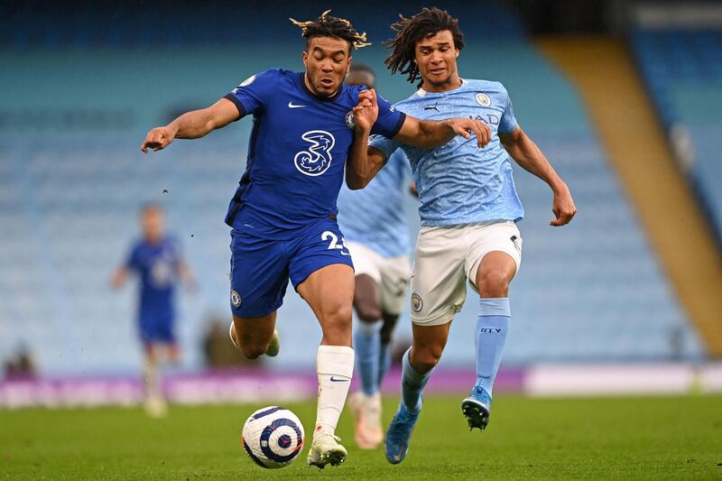 Chelsea's Reece James and Nathan Ake of City battle for possession. AFP