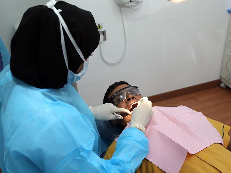 Last year’s Oral Hygiene initiative examined about 2,000 labourers in Dubai and found above average prevalences of gum disease linked to diabetes and heart disease. For about 700 of the men, it was their first dental check-up. Satish Kumar / The National