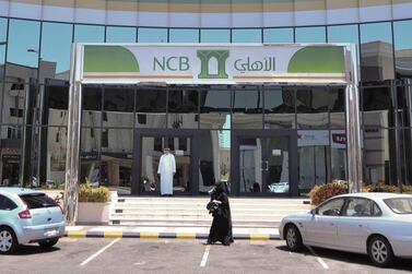 A branch of Saudi Arabia's National Commercial Bank. The kingdom's central bank instructed all non-essential bank staff to work from home for 16 days in a measure aimed at restricting the spread of the coronavirus. Michael Bou-Nacklie / The National