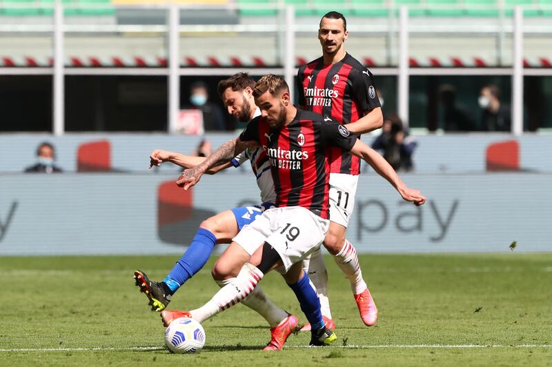 Theo Hernandez of AC Milan battles for possession with Bartosz Bereszynski of Sampdoria. getty