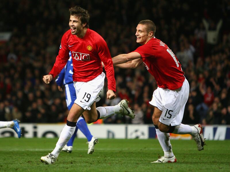 Gerard Pique of Manchester United celebrates scoring the opening goal with teammate Nemanja Vidic during the Champions League Group F match against Dynamo Kyiv at Old Trafford on November 7, 2007 in Manchester, England. Getty Images