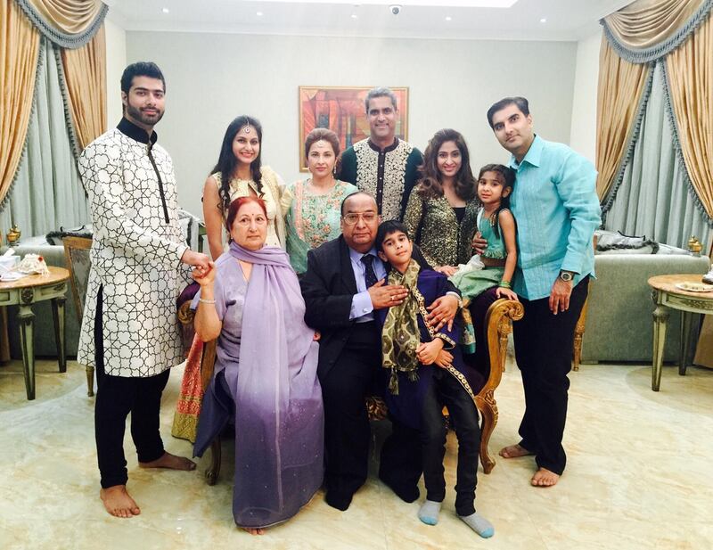 Vasu Shroff (seated) in a family photo during the Diwali festival in 2015. His grandson Krish, extreme left, convinced him to write a book about his life in Dubai. Courtesy: Shroff family