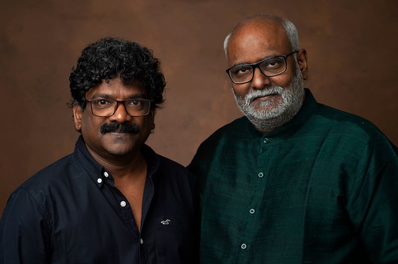Lyricist Chandrabose, left, and composer M M Keeravaani could soon win an Oscar for Naatu Naatu. AP