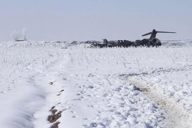  A view of the wreckage of a US Air Force E-11A plane a day after it was crashed in Deh Yak district of Ghazni, Afghanistan, 28 January 2020.  EPA/STR