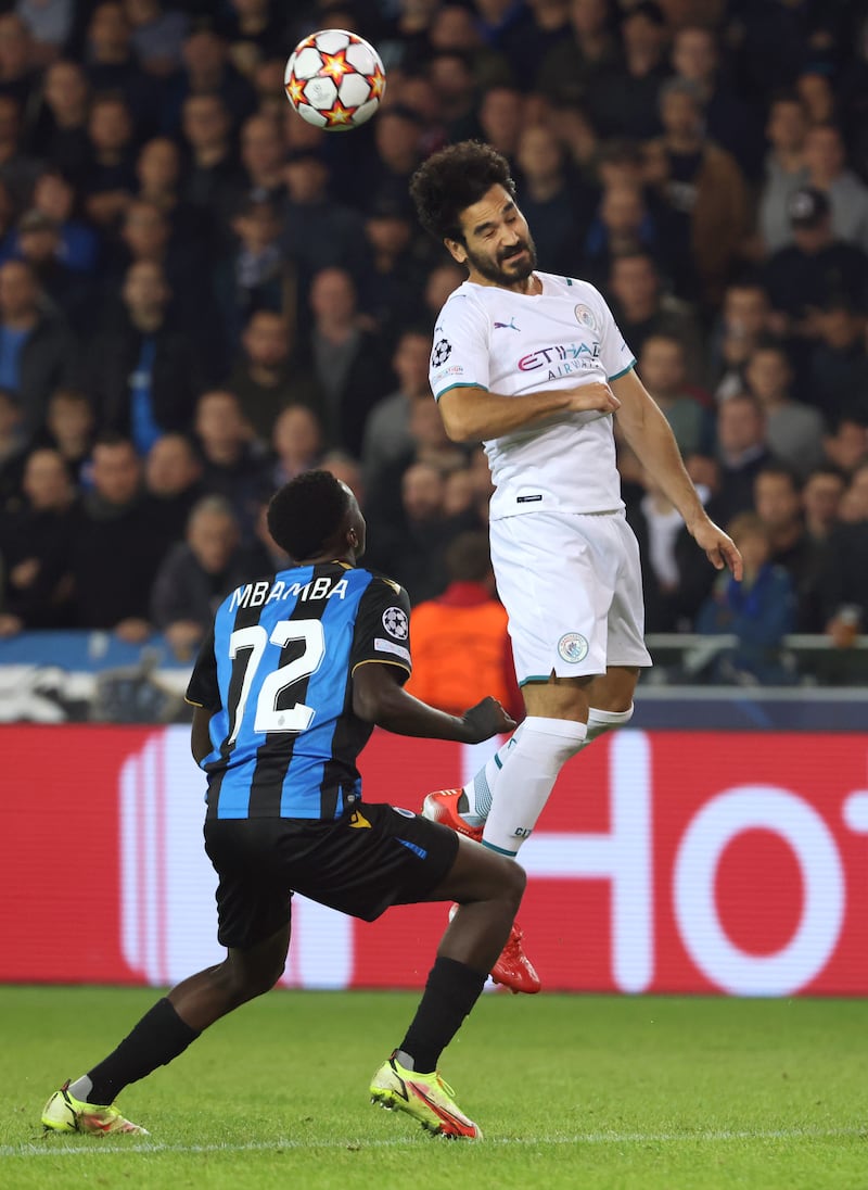 City substitute Ilkay Gundogan wins a header. Reuters