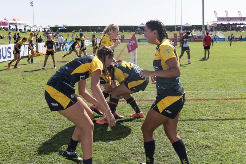 DUBAI, UNITED ARAB EMIRATES - DECEMBER 1, 2018. 

Dubai Hurricanes teammates warm up before their match on the final day of this year's Dubai Rugby Sevens.

(Photo by Reem Mohammed/The National)

Reporter: 
Section:  NA POAN